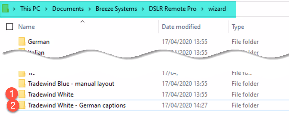 The wizard folder now contains both the original Tradewind White theme (1), and the copy called Tradewind White – German captions (2)
