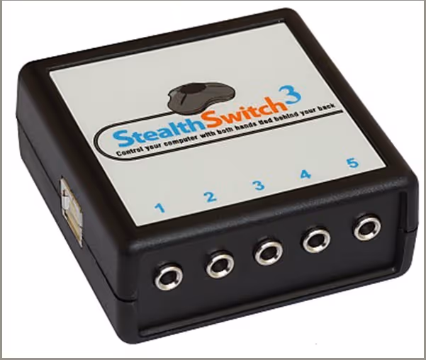 StealthSwitch 3 showing the USB connector on the side and five 3.5mm sockets on the front for connecting auxiliary switches and the coin acceptor