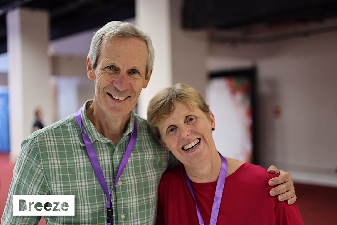 Chris Breeze and Sue Breeze smiling at the end of Photo Booth Expo London 2023
